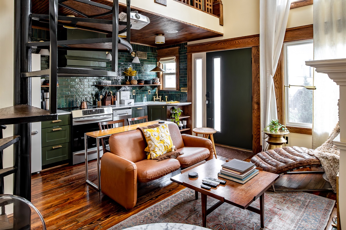 The living room is vaulted to nearly 30 feet with massive floor to ceiling windows and skylights, creating a truly unique experience of space and light.