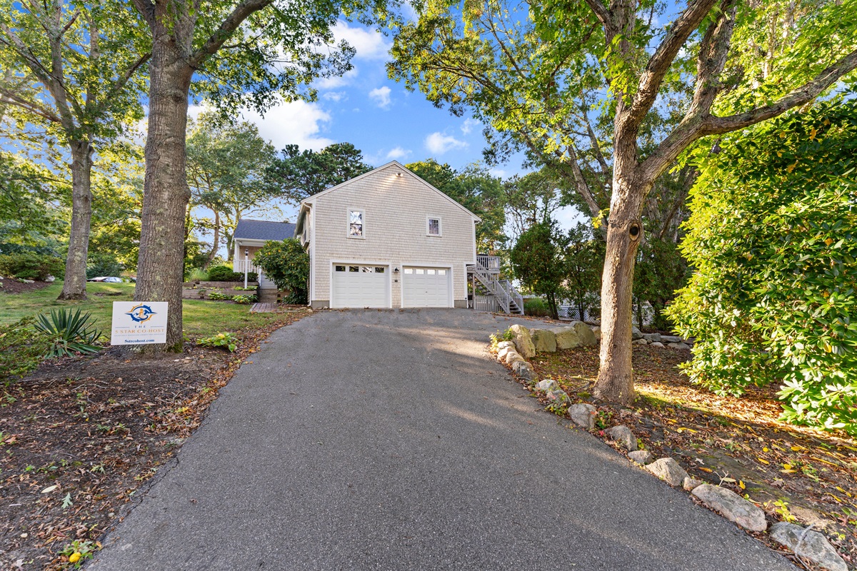 With a wide, expansive driveway, there's ample space for all your vehicles and guests.