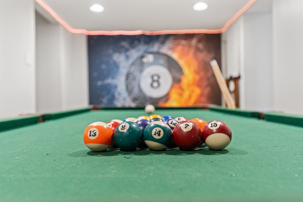 Challenge your group to a game of pool and enjoy some friendly competition.