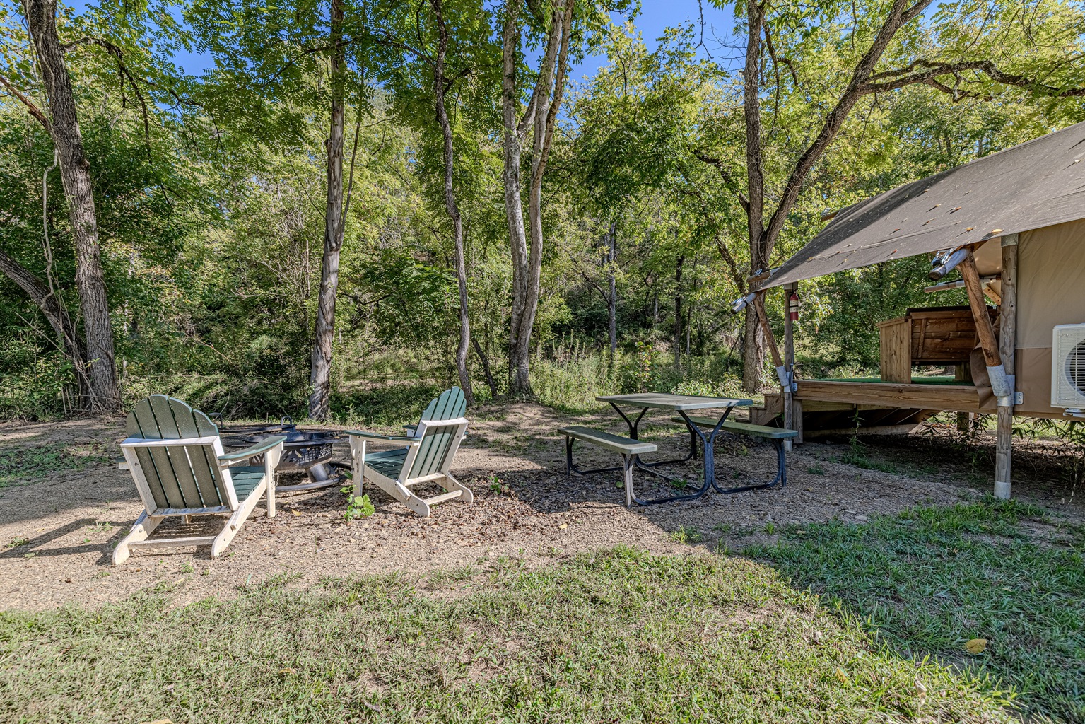 Grilling, dining, and relaxing. Your glamping experience extends far beyond the tent with this beautiful, private area for all your outdoor activities.