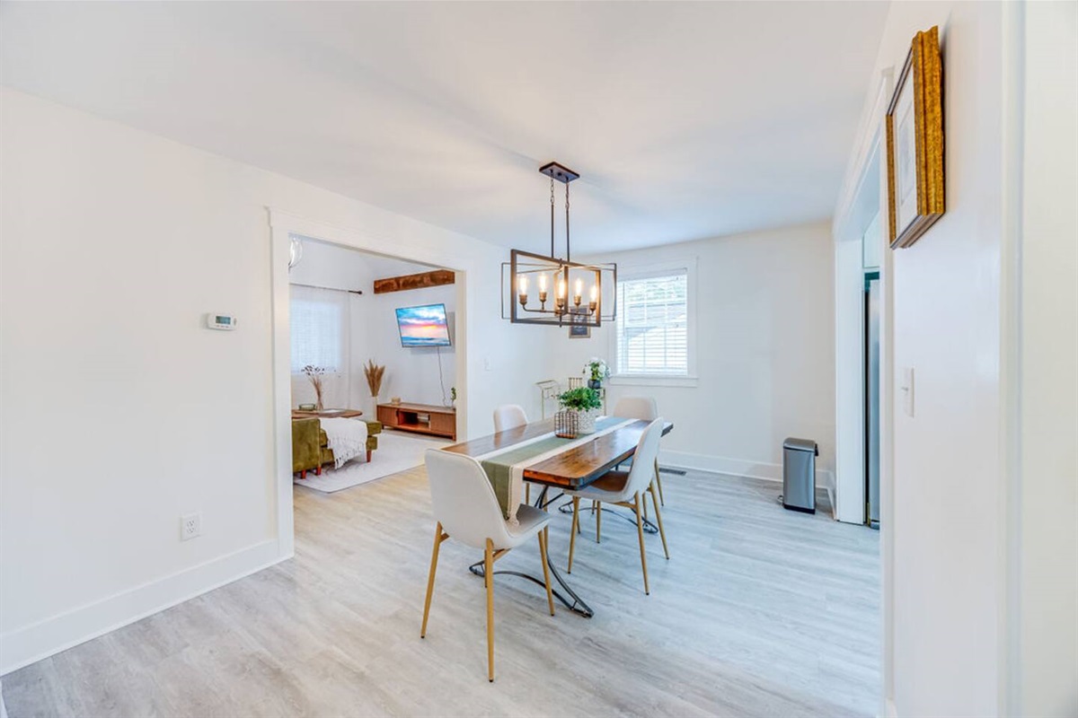 Charming four-seater dining area, perfect for enjoying meals and quality time with family or friends.
