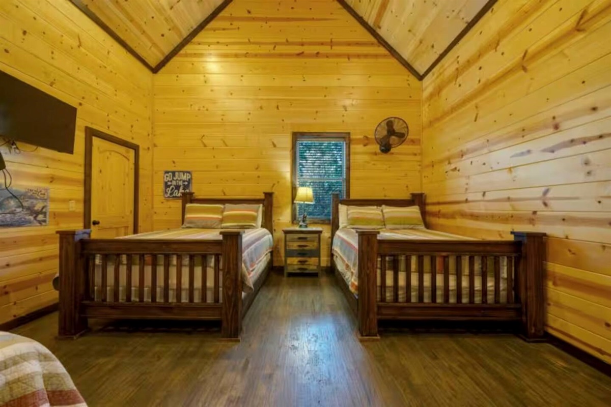 Loft room fit for the kids: 2 fulls + twin = giggle zone.