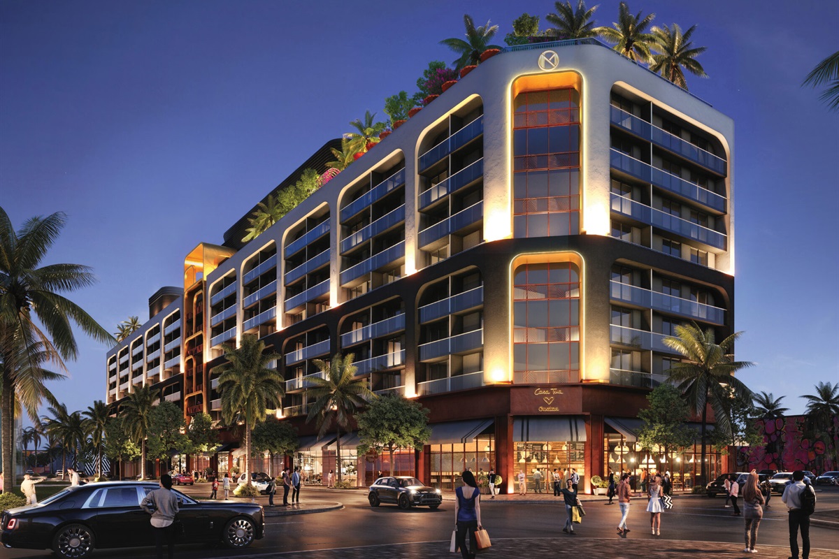 NoMad Wynwood - award-winning hotel-condo lit up at night in the Miami arts district.