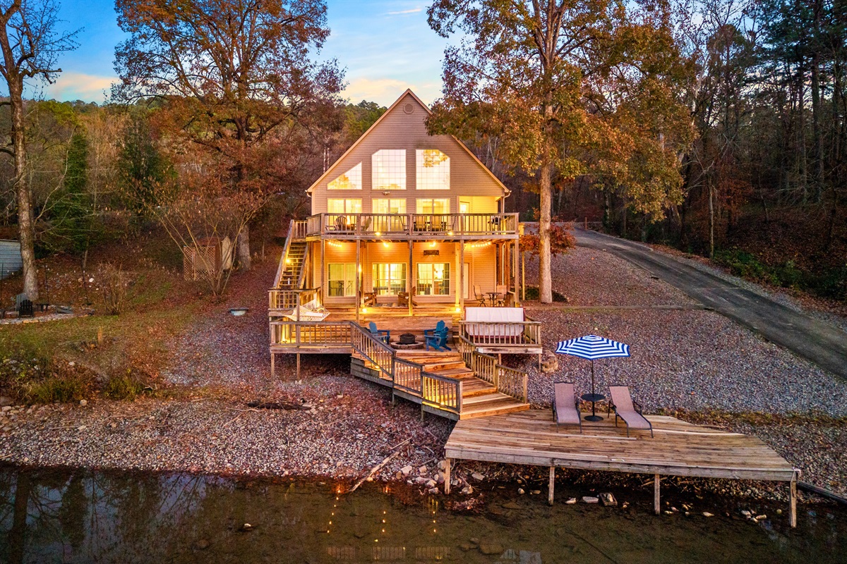 This broad lakeside view showcases how beautifully The Lonestar sits along the water, offering easy access and stunning scenery from every direction.
