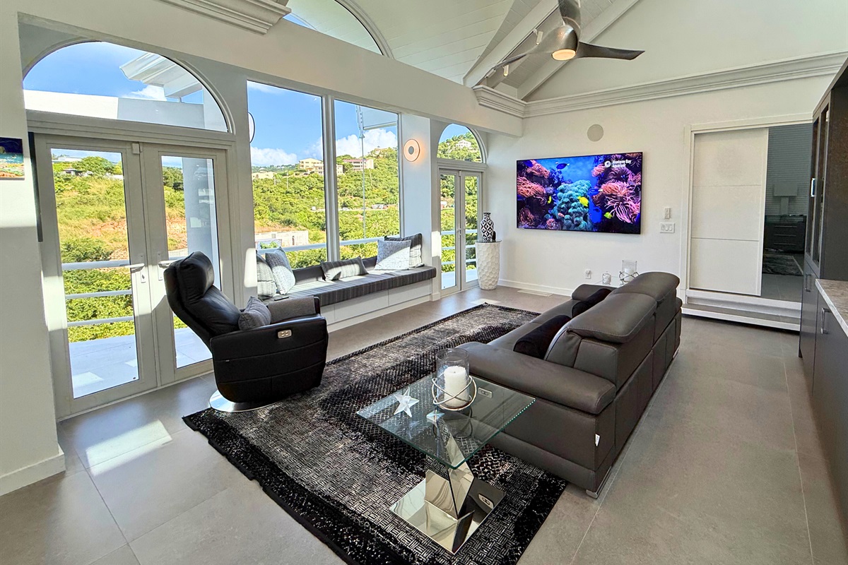 Bright living room with comfy seating and Smart TV
