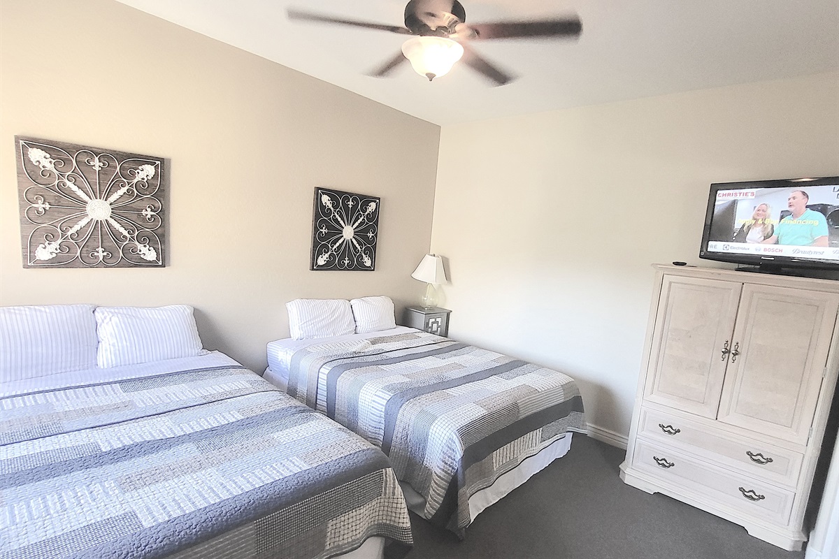Guest bedroom with two queen beds