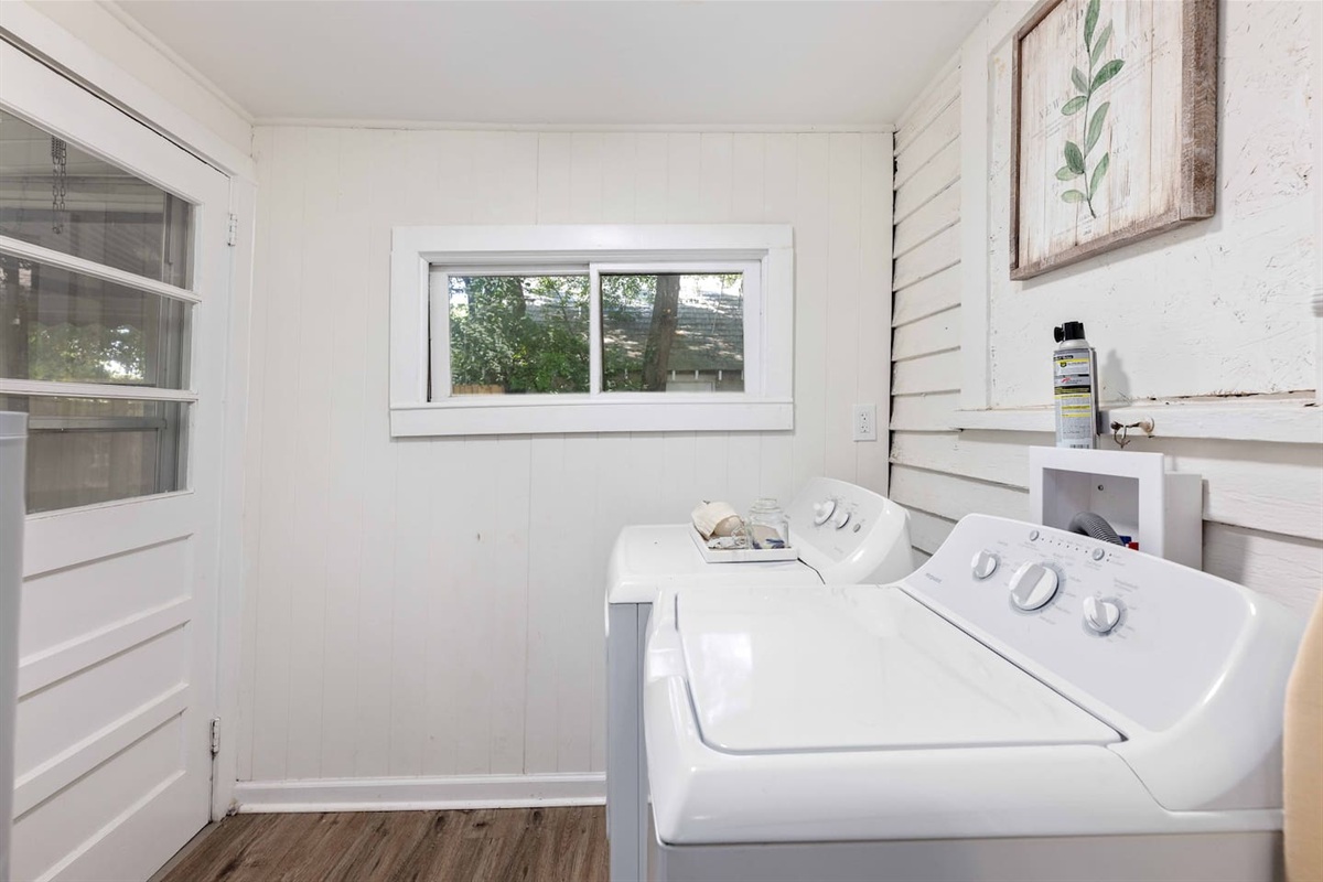 Enter home into laundry room, then enter into kitchen. 