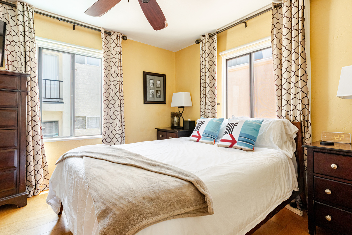 Cozy Bedroom #1 includes queen Casper memory foam mattress wrapped in high end linens and adorned with a variety of memory foam and standard pillows.There's a peek a boo ocean view from the window next to the tall dresser. Wake up to the ocean sounds.