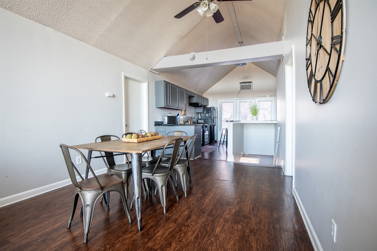The spacious dining area in Unit G sits between the kitchen and living room, giving plenty of room to enjoy your favorite meals together or mull over a game of Monopoly.