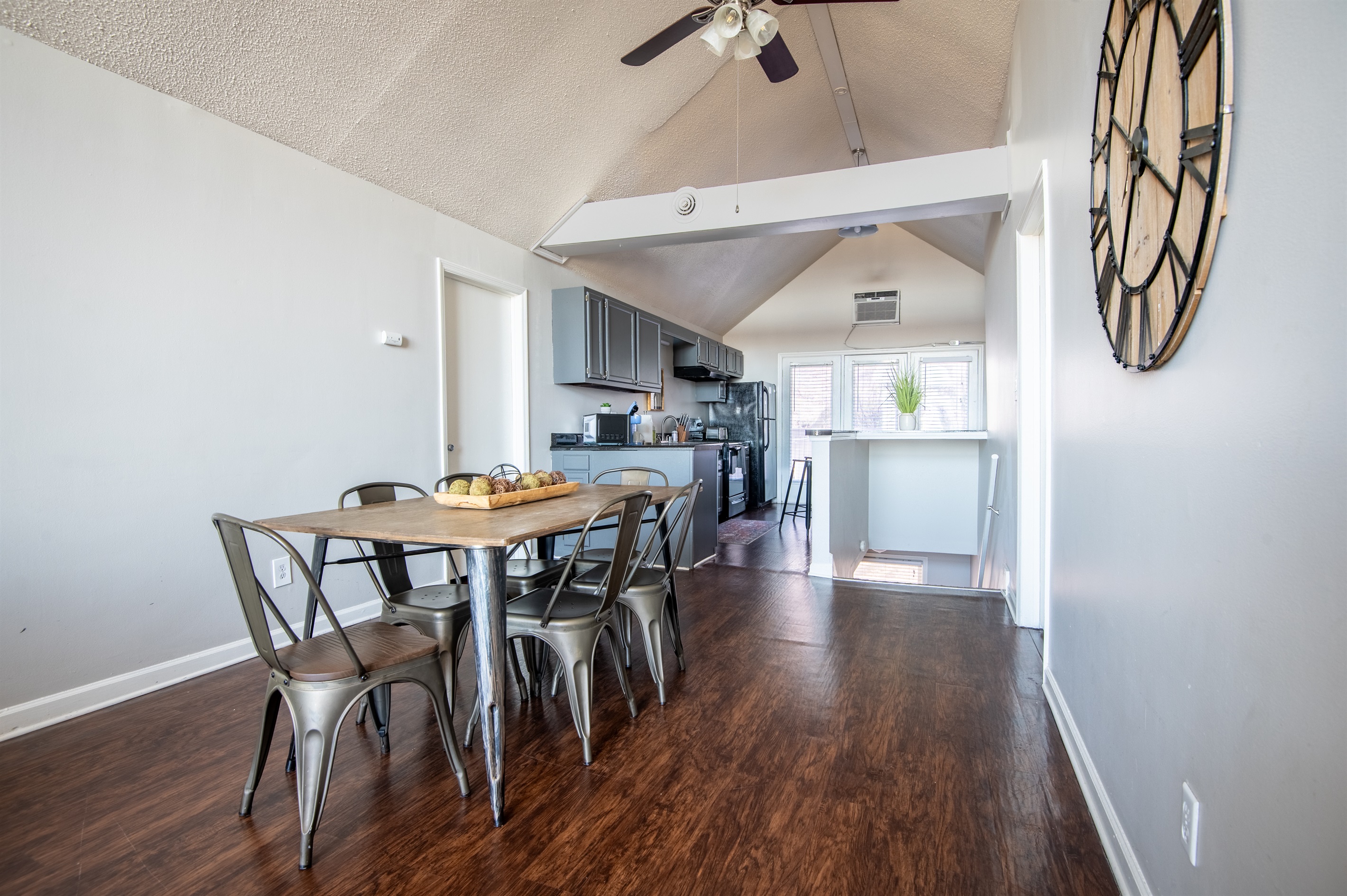 The spacious dining area in Unit G sits between the kitchen and living room, giving plenty of room to enjoy your favorite meals together or mull over a game of Monopoly.