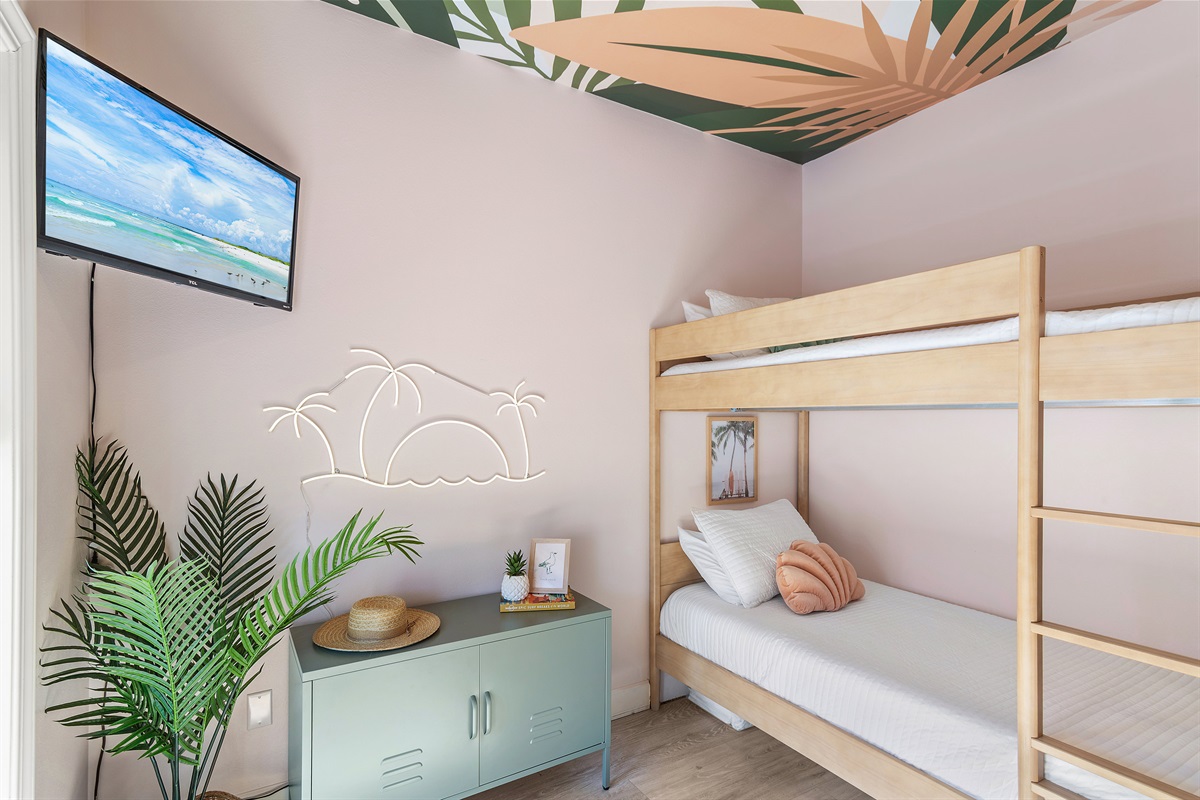 Guest Room 4 (Level 2): Two Twin Bunk Beds, Smart TV, Balcony Access, Hallway Bathroom with Shower Tub Combo on Level 2 or Bathroom with Walk in Shower on Level 1 (Sleeps 4)