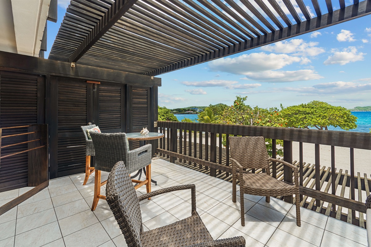 watch the boats and sunbathers from your private terrace