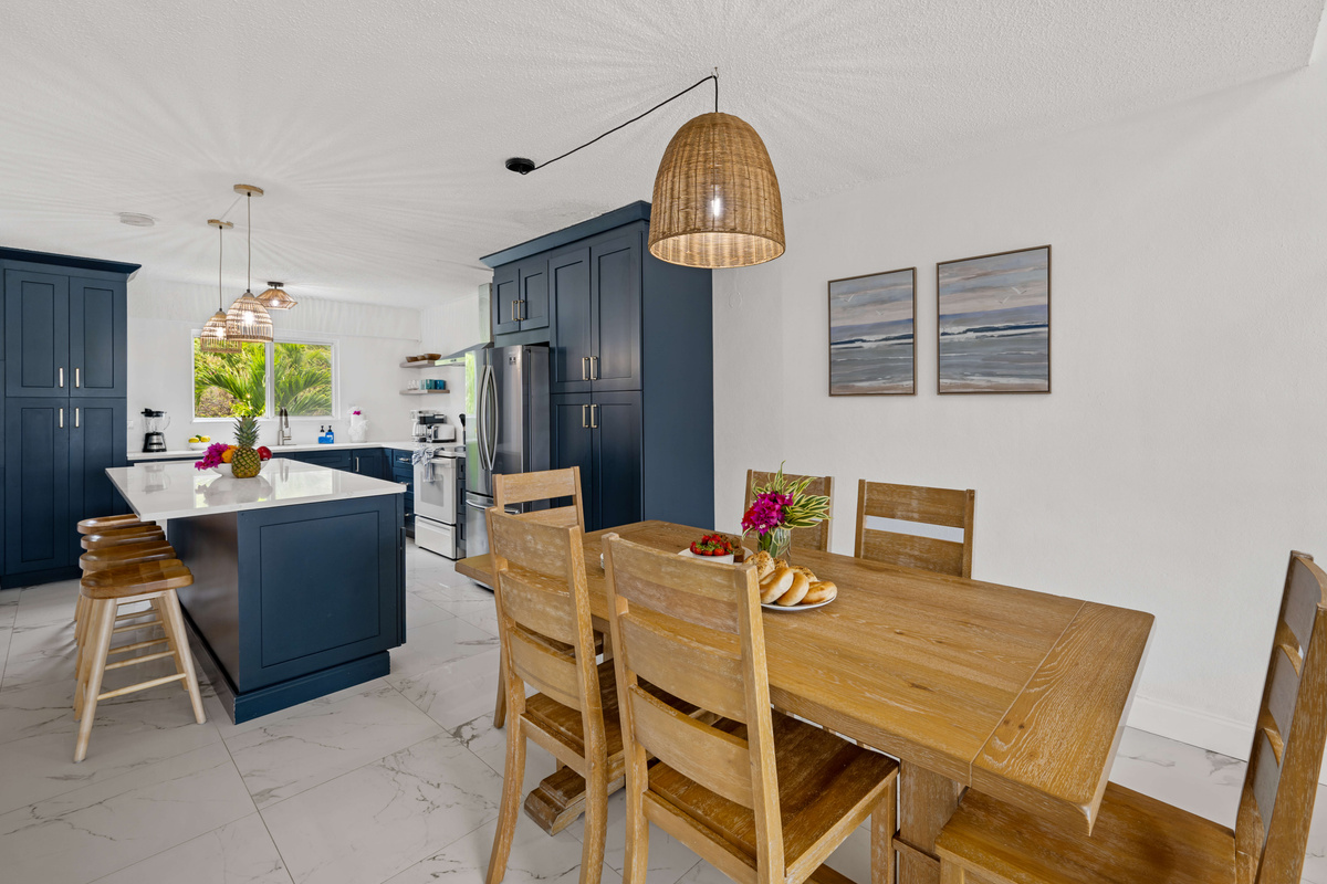 Gather around the dining table and enjoy meals together after a day in paradise.