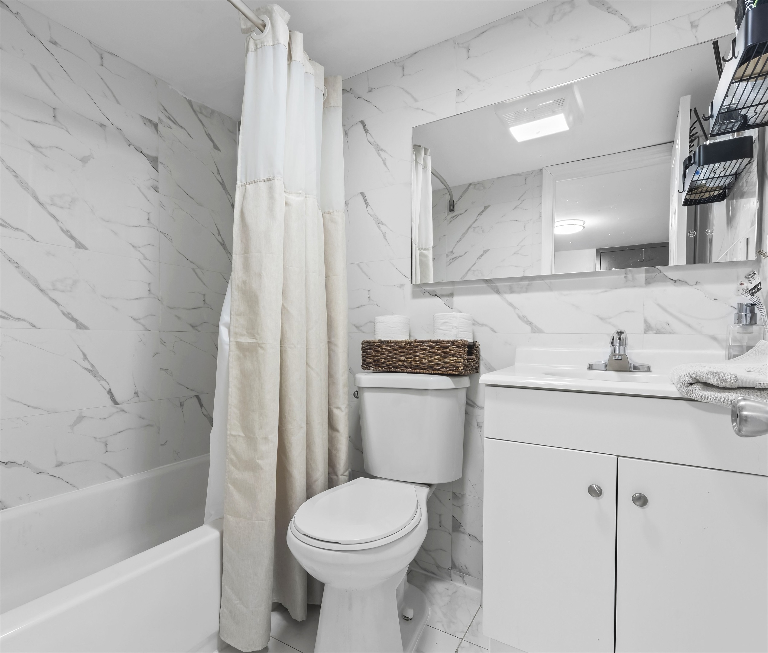 Treat yourself to slow mornings or relaxing evenings in this spa inspired bathroom with a clean, calming feel.