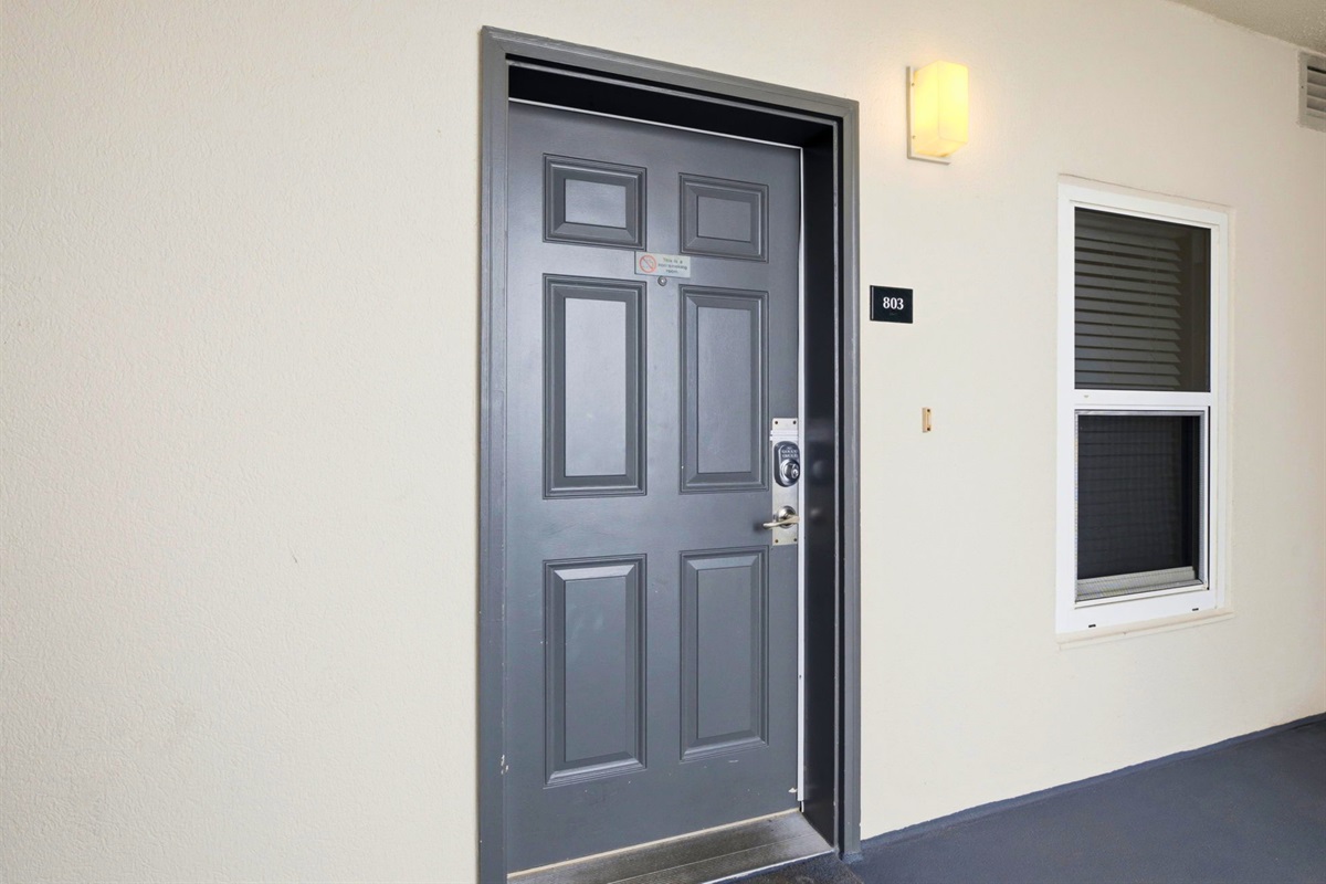 Your beach getaway begins right outside this welcoming front entrance.