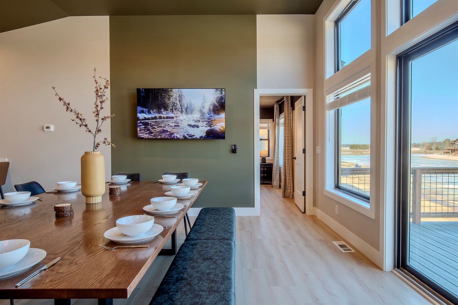 Our dining area & kitchen island will seat up to 16 guests while overlooking the man made lake.  Play games & or  eat meals together all in the same space.
