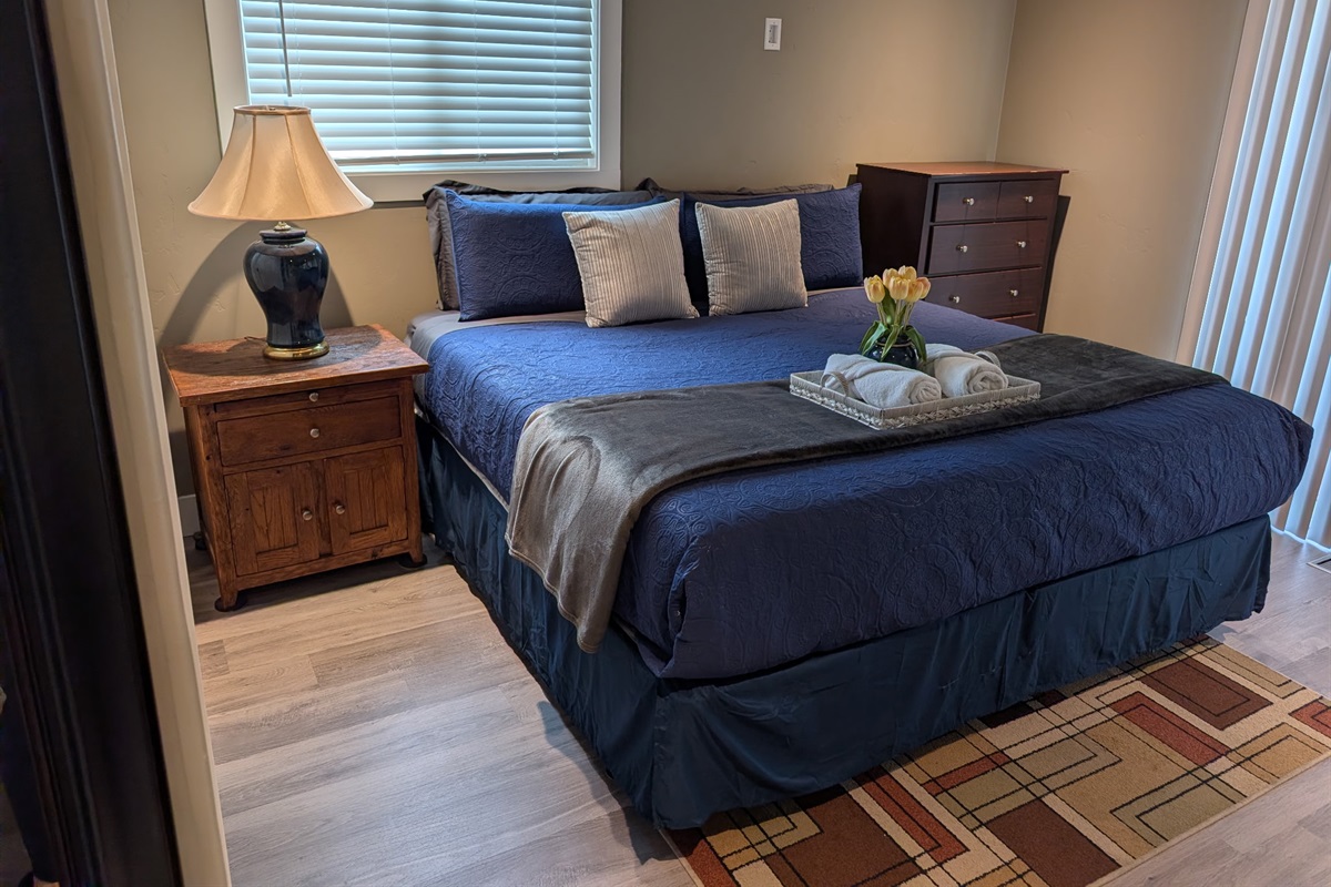 Master Bedroom with king bed with a smart tv