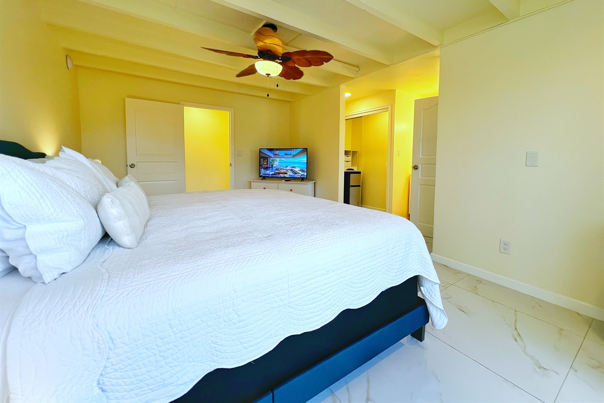 With soft linens and ample space, these bedrooms are crafted for comfort.