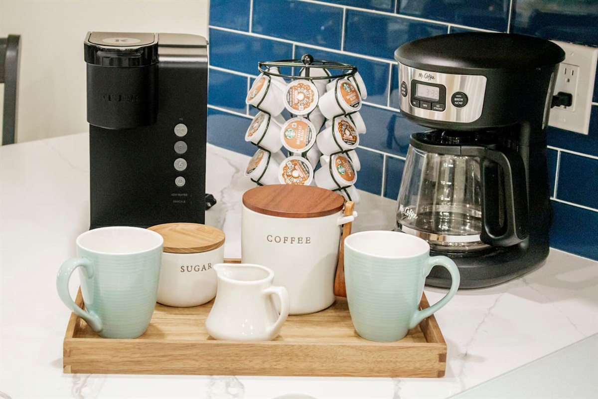 Coffee bar with Keurig and drip coffee maker.