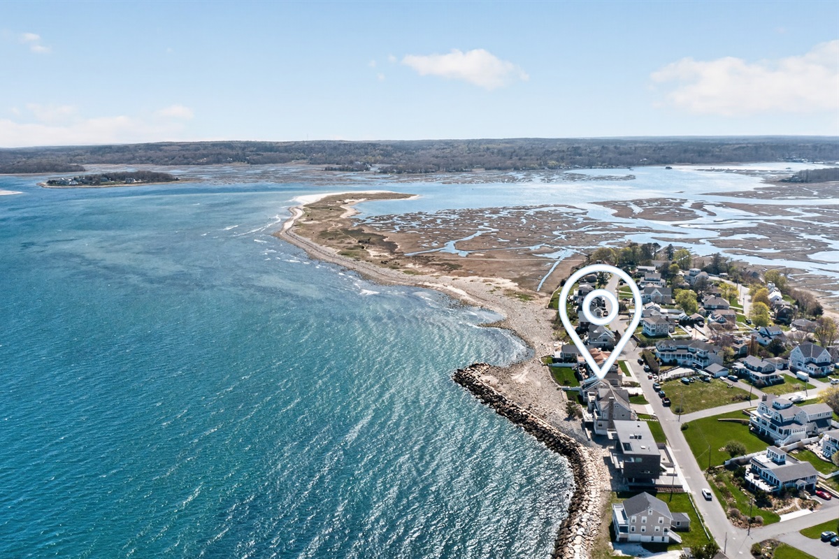 Aerial views capturing the calm beauty of home and ocean.