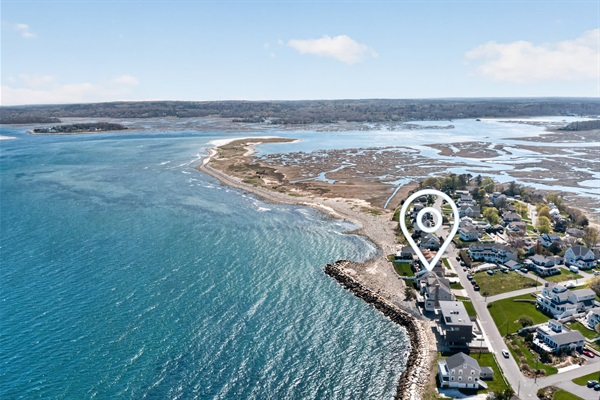 Aerial views capturing the calm beauty of home and ocean.