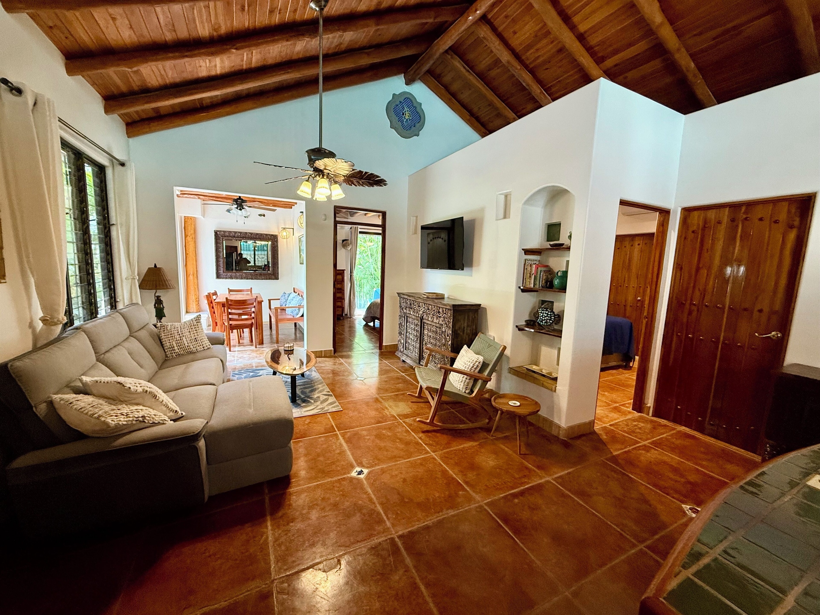 Living room/dining room with entrance into bedroom 1 and 2 