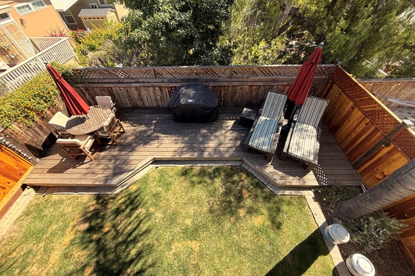 Deck outdoor living as seen from primary balcony
