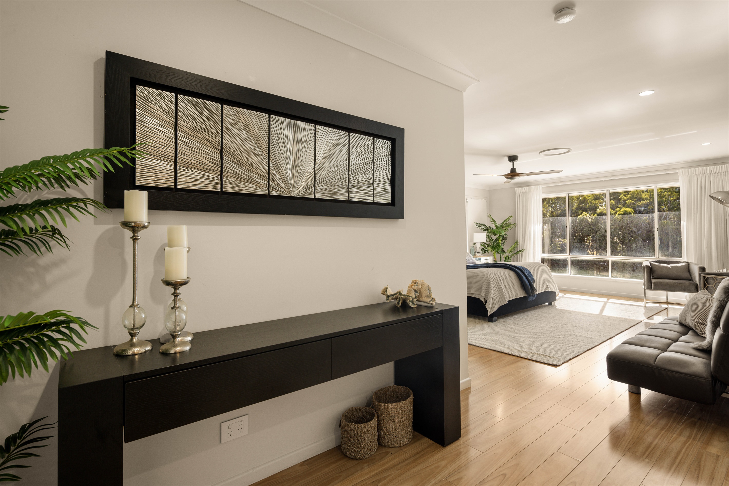 Thoughtfully styled private sanctuary with generous proportions. Includes a compact sofa bed suitable for a small child.