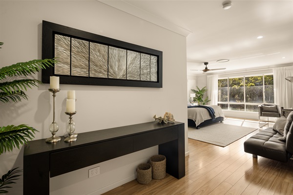 Thoughtfully styled private sanctuary with generous proportions. Includes a compact sofa bed suitable for a small child.