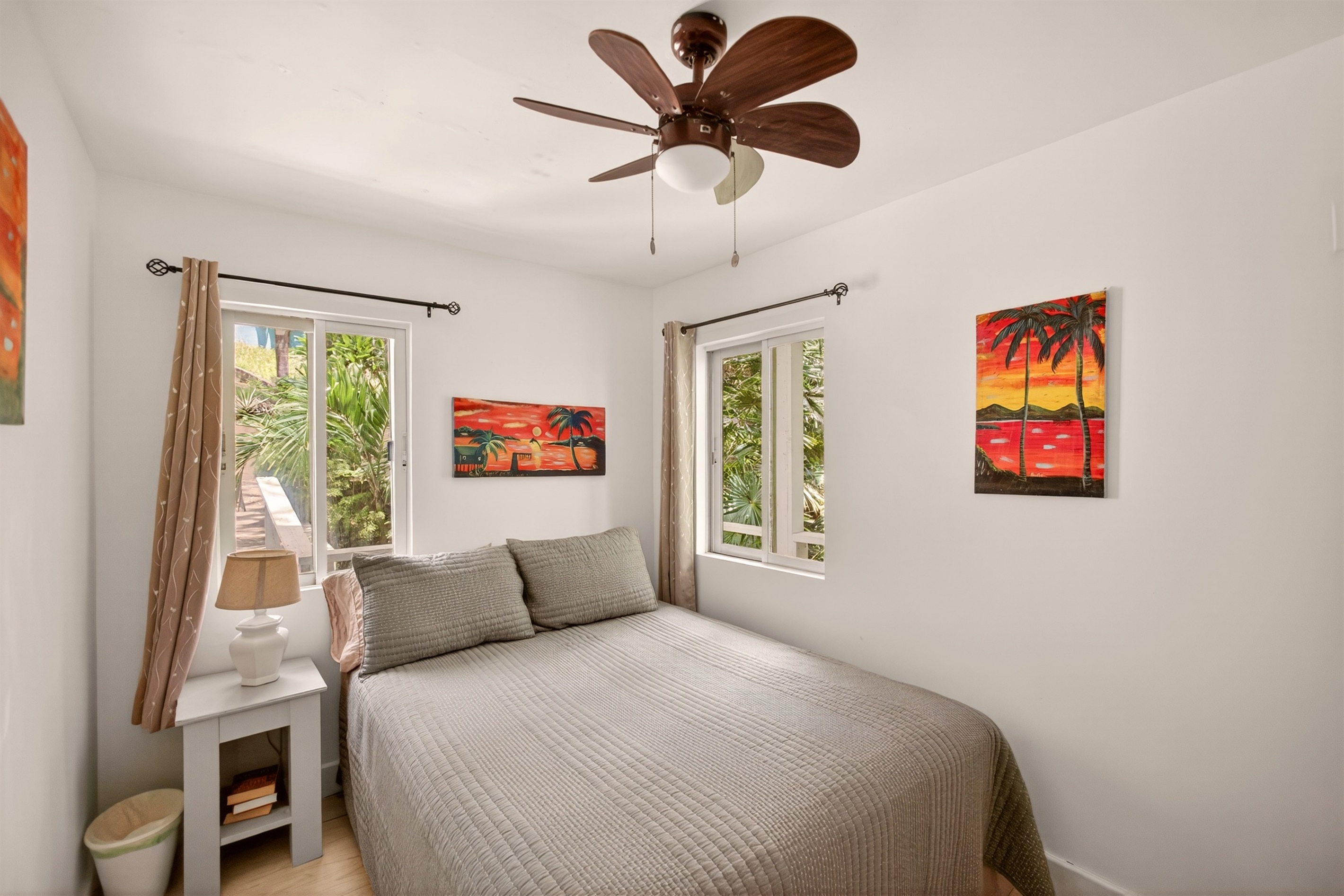 Main level bedroom with queen bed