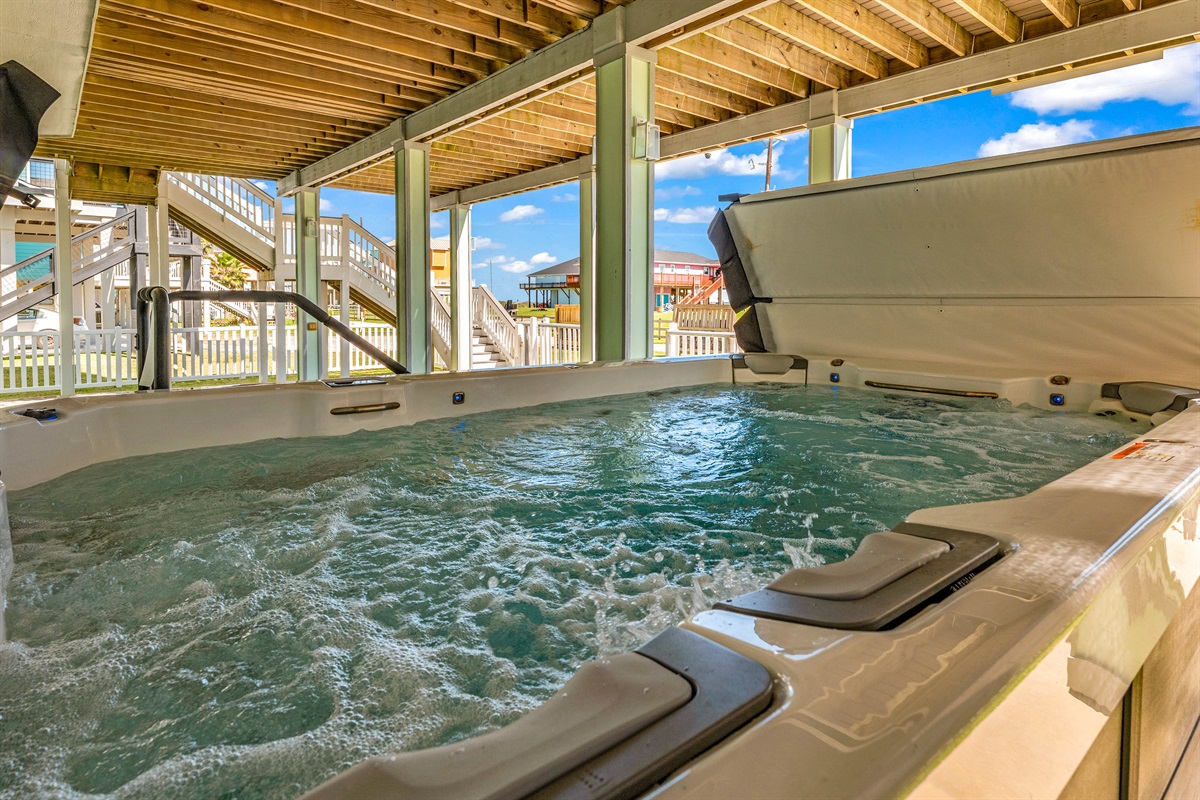 Crystal Paradise Outdoor Space: Take a soothing soak or swim in place in the resort-style swim spa designed for both fun and relaxation.