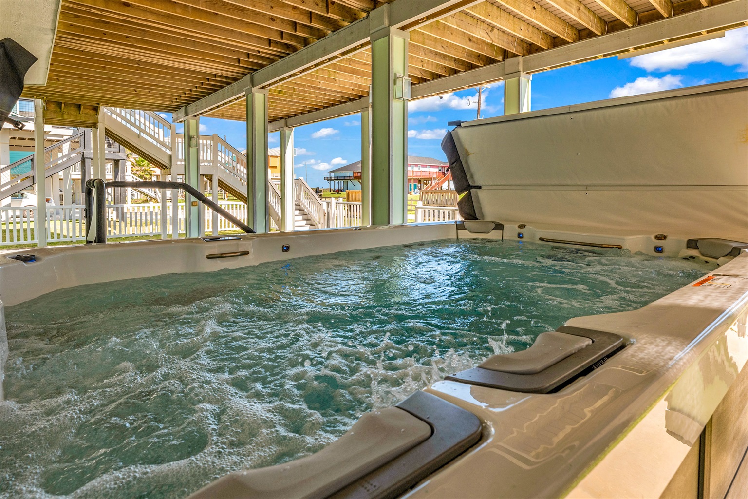 Crystal Paradise Outdoor Space: Take a soothing soak or swim in place in the resort-style swim spa designed for both fun and relaxation.