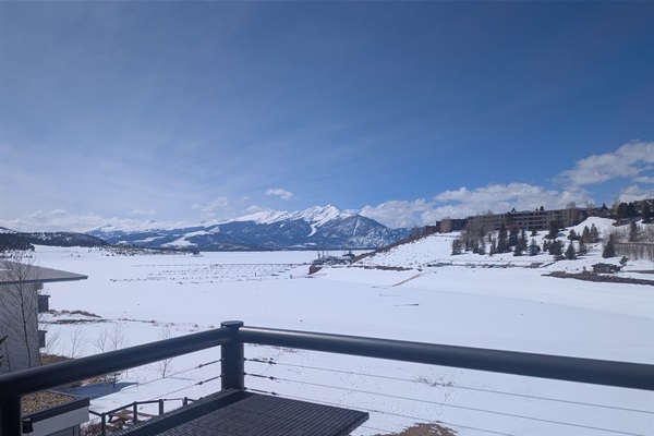 Deck wth lake and mountain view