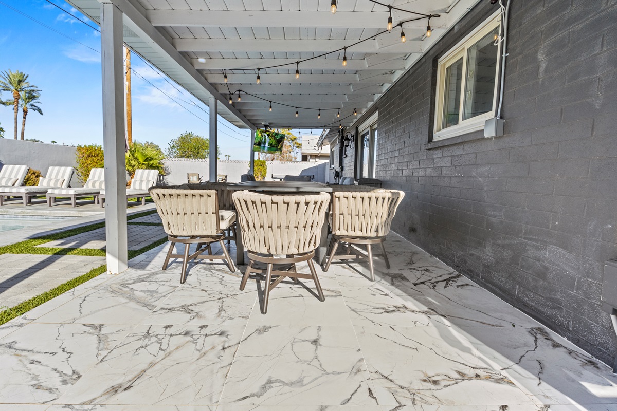 Gather with friends under the shaded patio, the perfect spot for morning coffee or sunset cocktails.