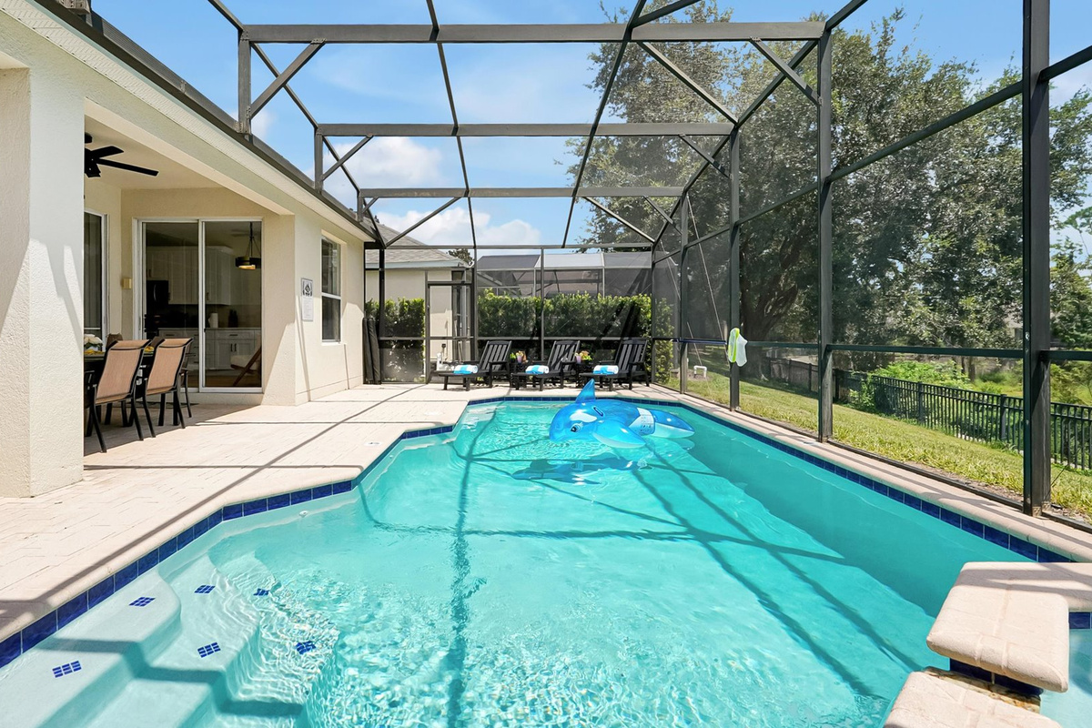 Private Pool and Spa: A spacious private pool and spa with a covered lanai, outdoor dining and barbecue.