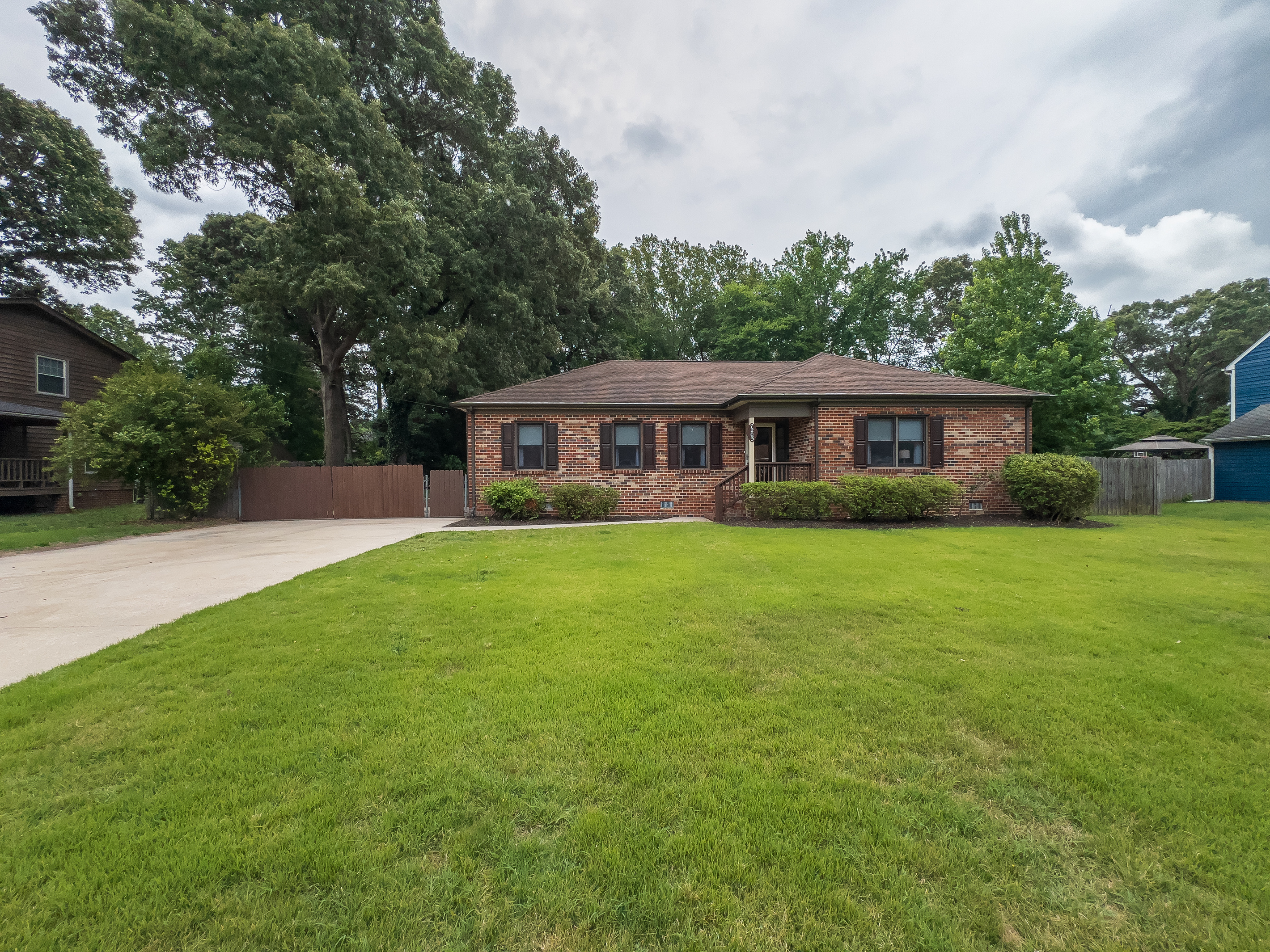 Front view, driveway, yard