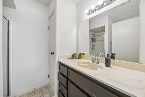 Full bathroom vanity with generous counter space.