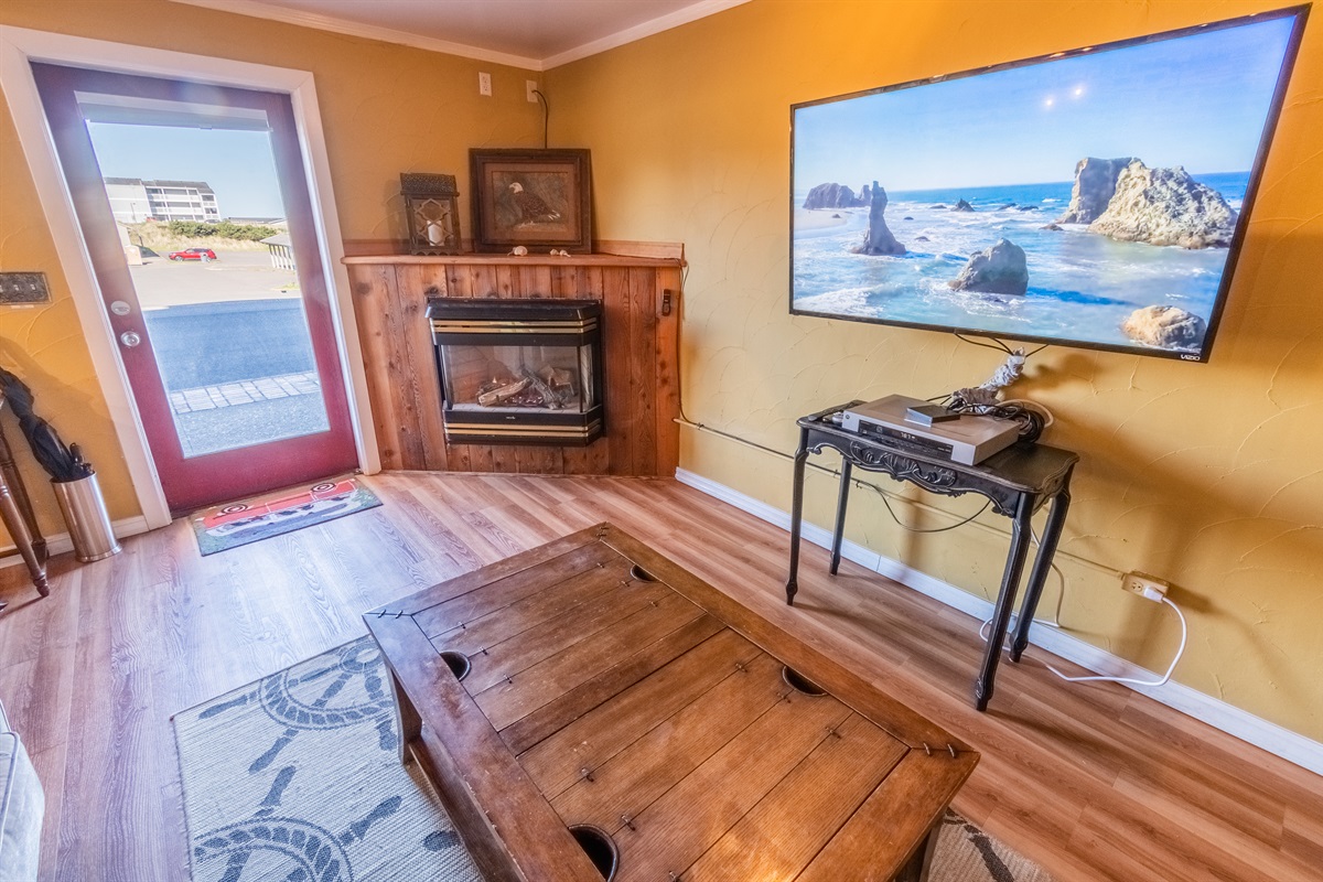 This open space studio features a gas fireplace, large streaming TV, full kitchen and many unique features and furnishings
