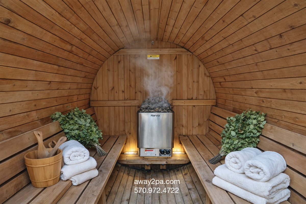 Breathe in warm cedar steam in the barrel sauna, fresh towels at the ready