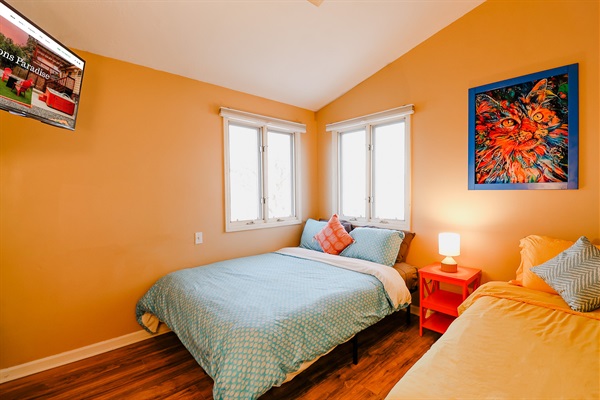 A cozy bedroom designed with soft lighting, plush bedding, and soothing colors, creating a tranquil sanctuary for rest and relaxation.