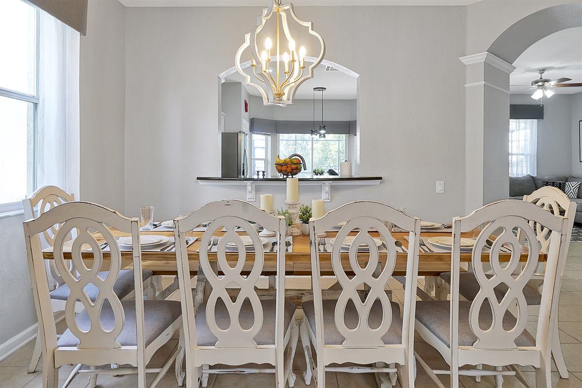 Semi-open to the kitchen, the large beautiful dining table is ready for easy serving.