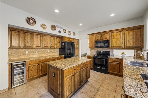 Gourmet Kitchen: Whip up culinary delights in this spacious kitchen with granite counters and plenty of room to cook.
