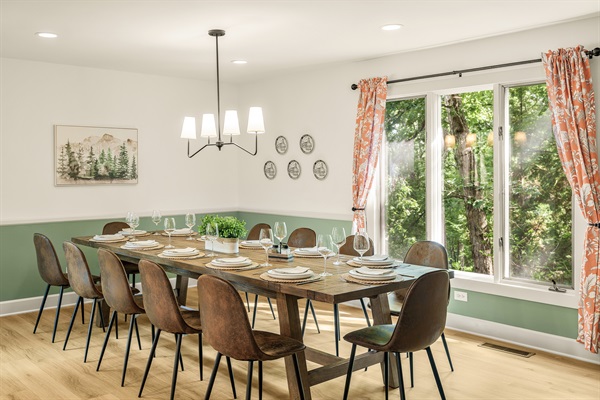 Spacious dining room with gorgeous solid wood extendable table, seats 12 comfortably.