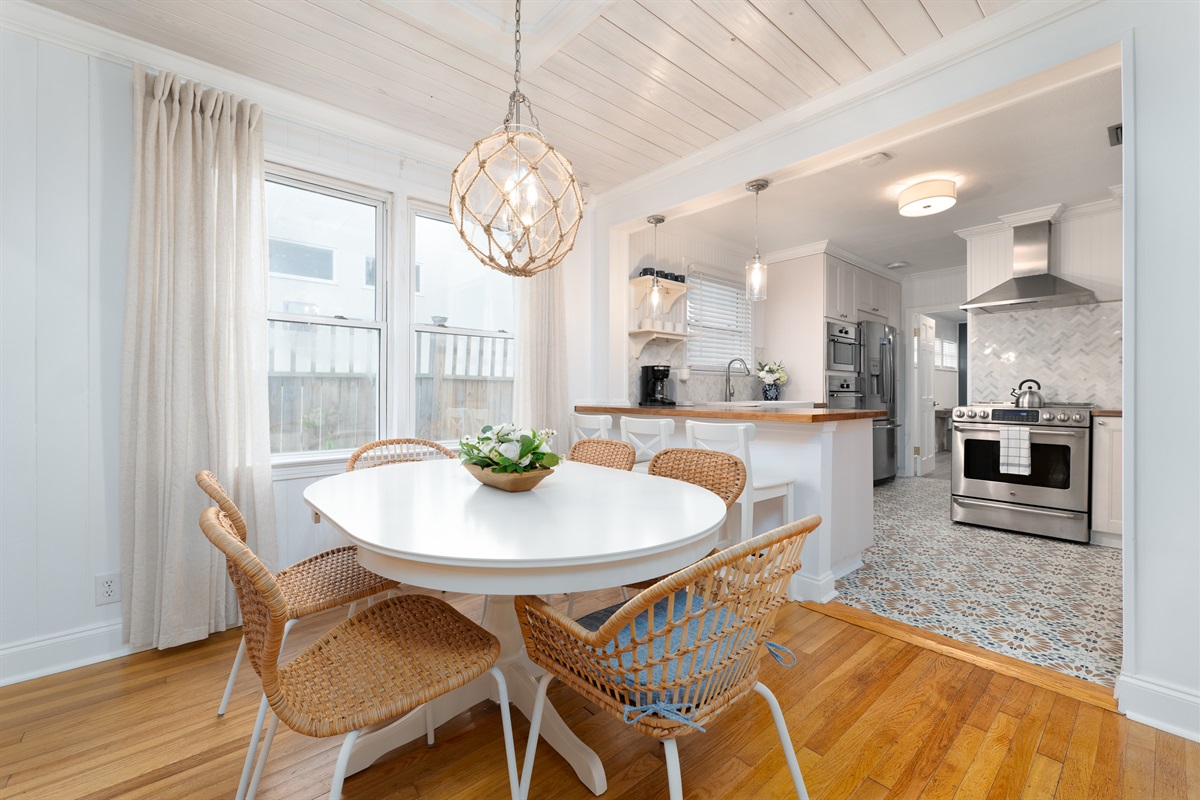 Gather around this bright dining space - perfect for family breakfasts or dinner parties after a beach day