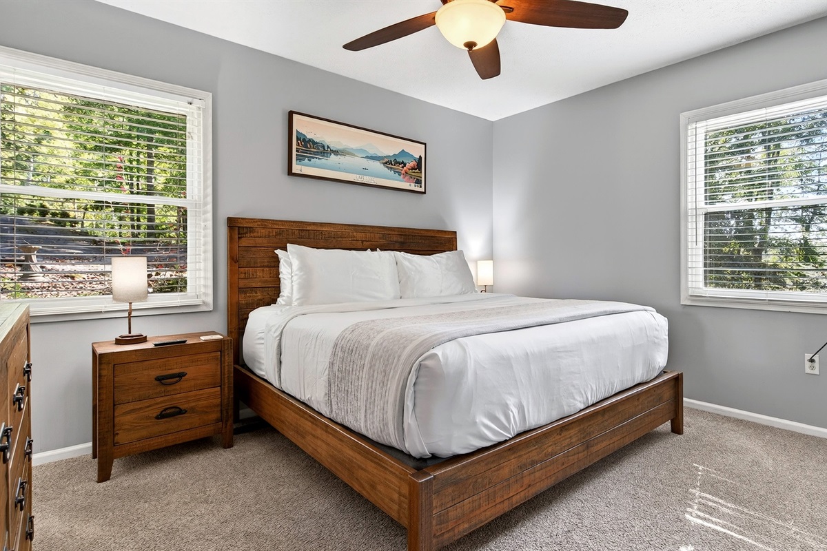 Main level master bedroom with a king size bed