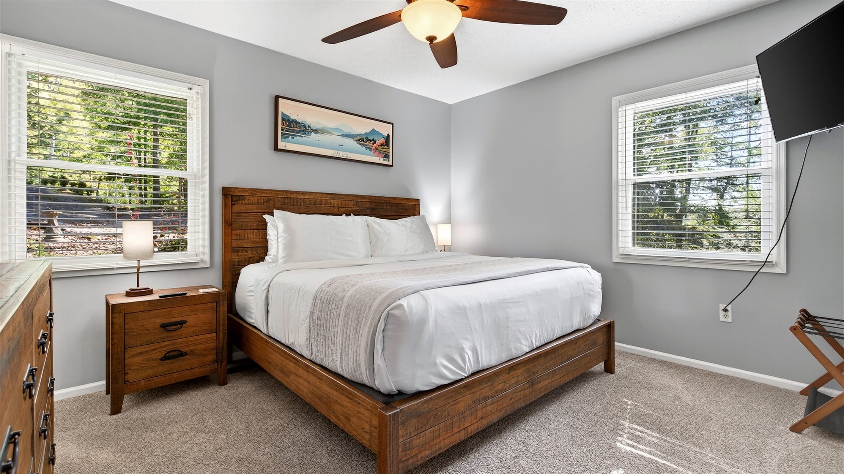 Main level master bedroom with a king size bed