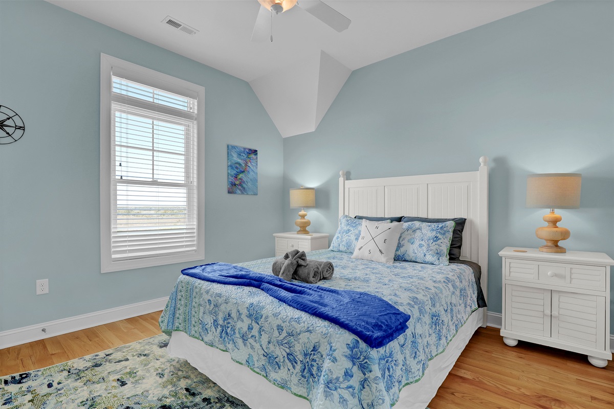 A serene king suite where the coastal breeze meets ultimate comfort.