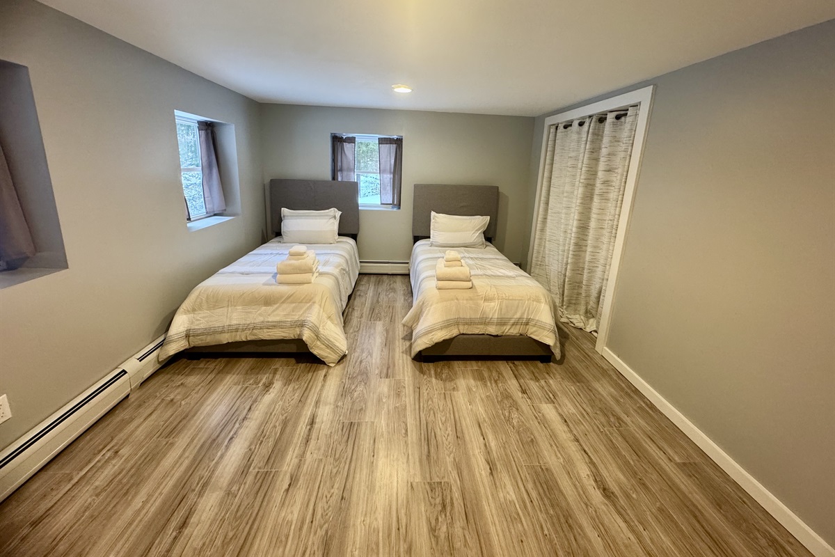 Twin bedroom in finished basement.