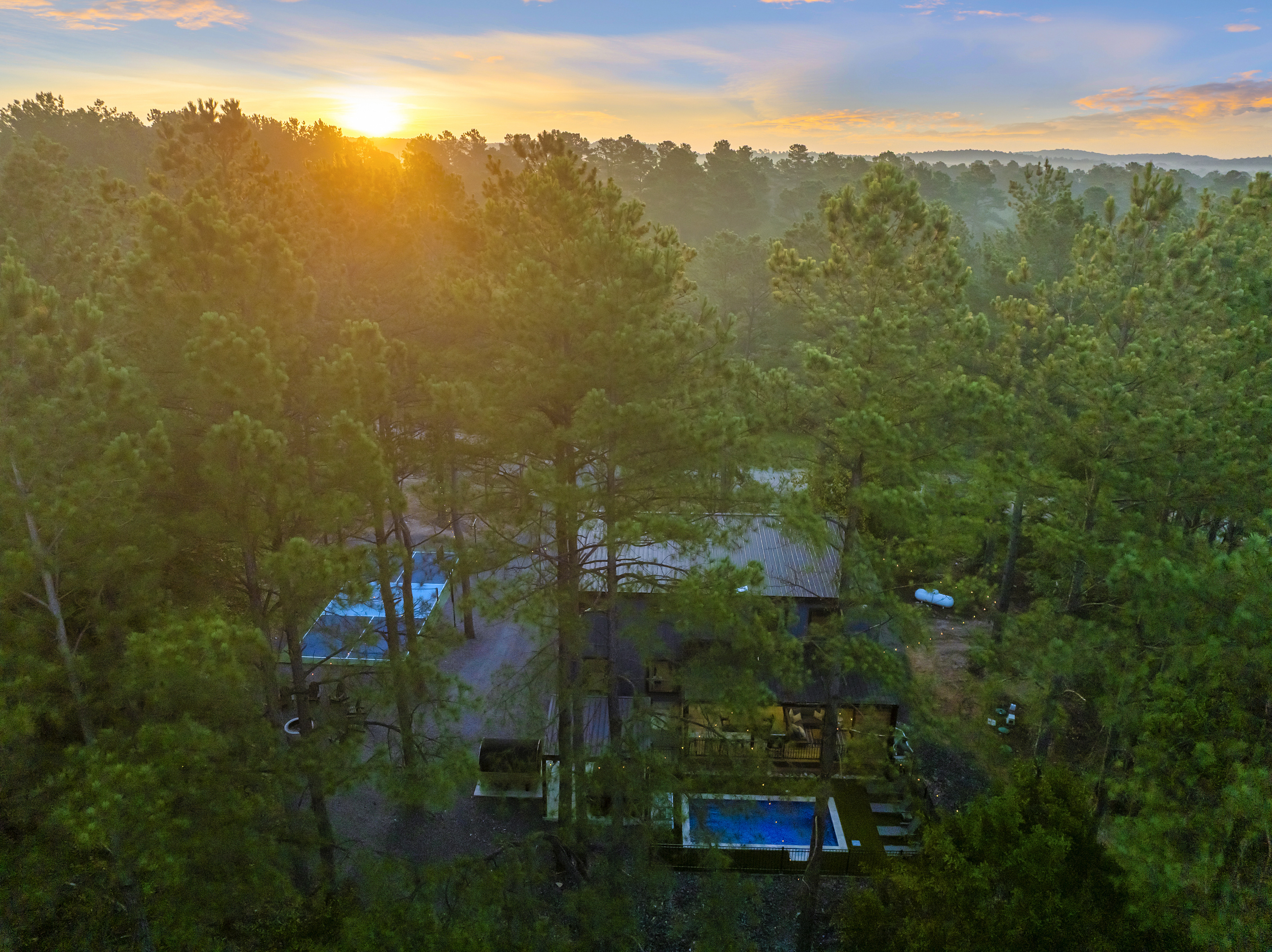 Come for the fun. Stay for sunsets like this. Your little corner of the pines is waiting.
