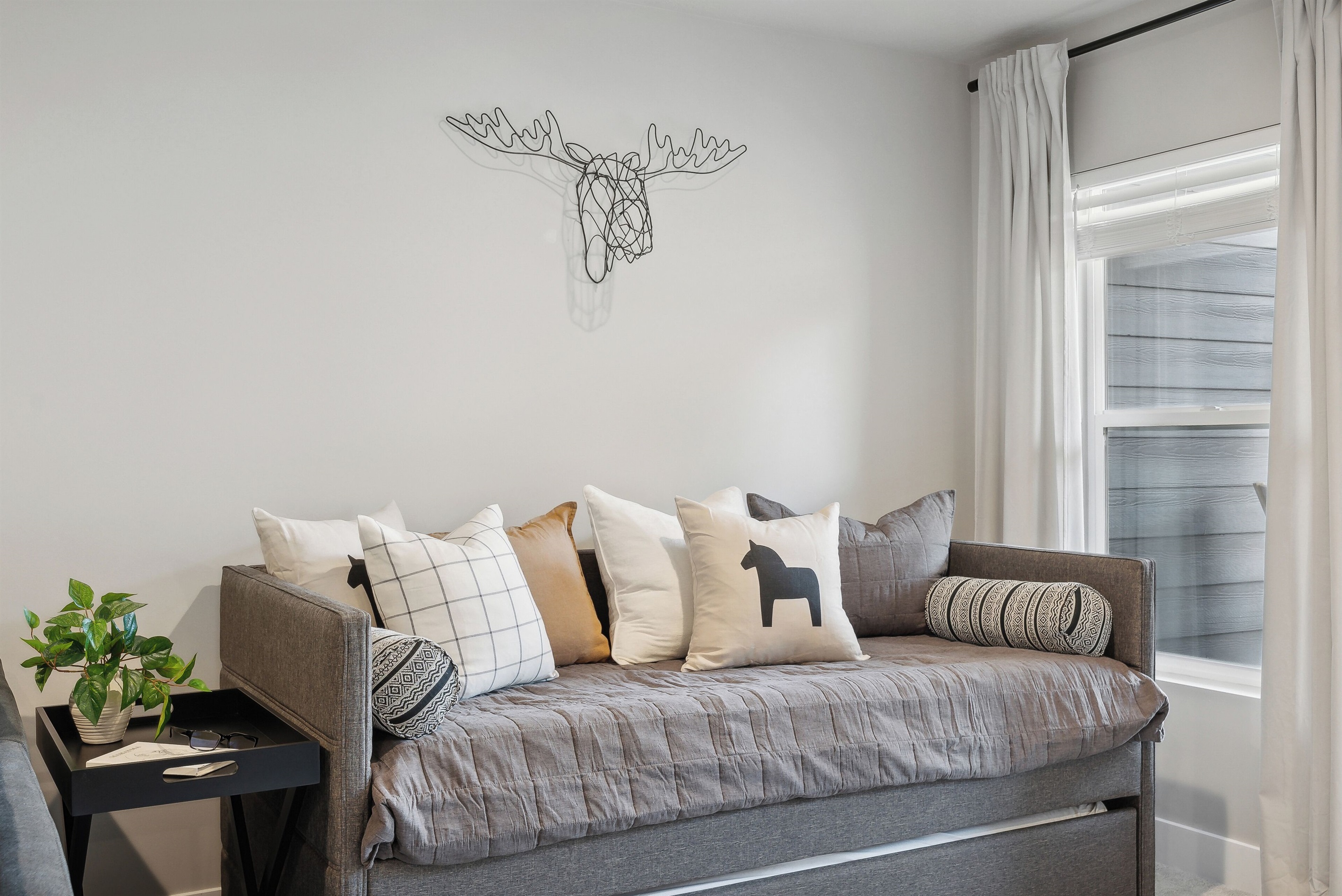 Your loft hideaway—comfortable seating by day, bonus sleeping by night.